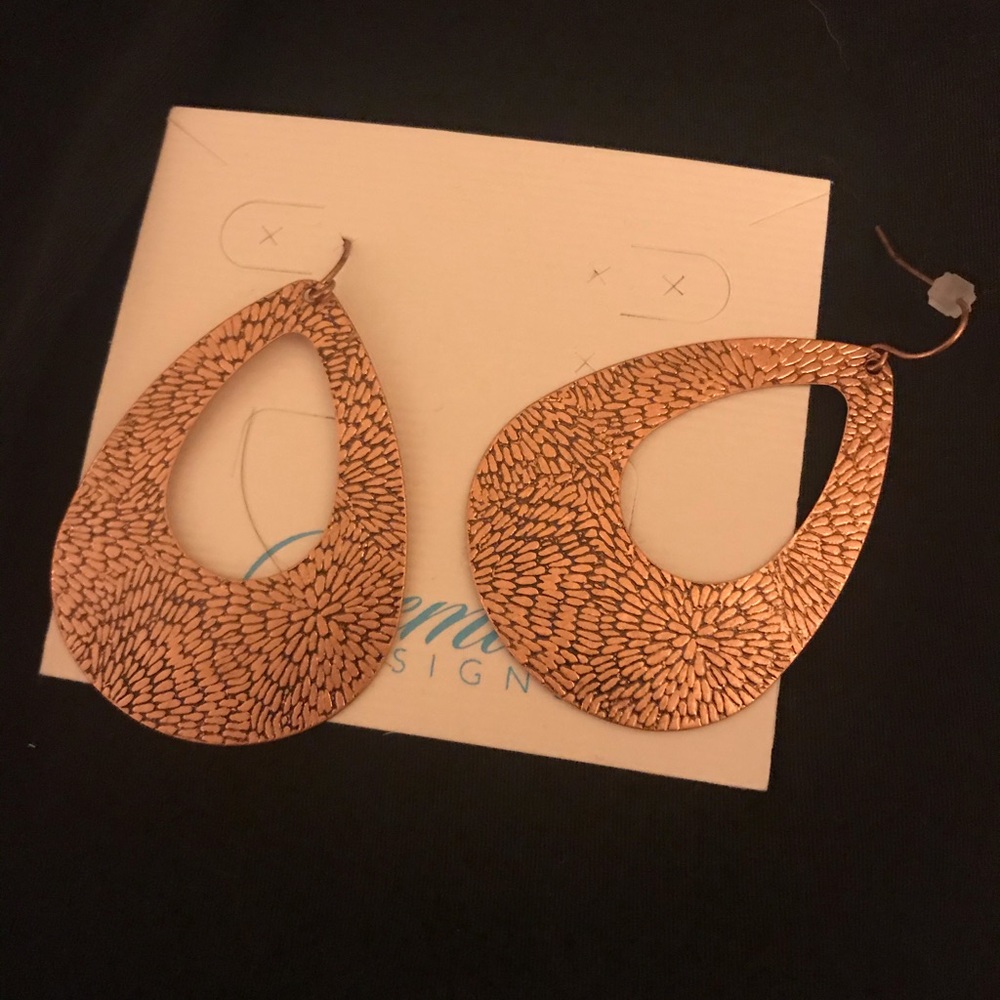 Copper earrings.